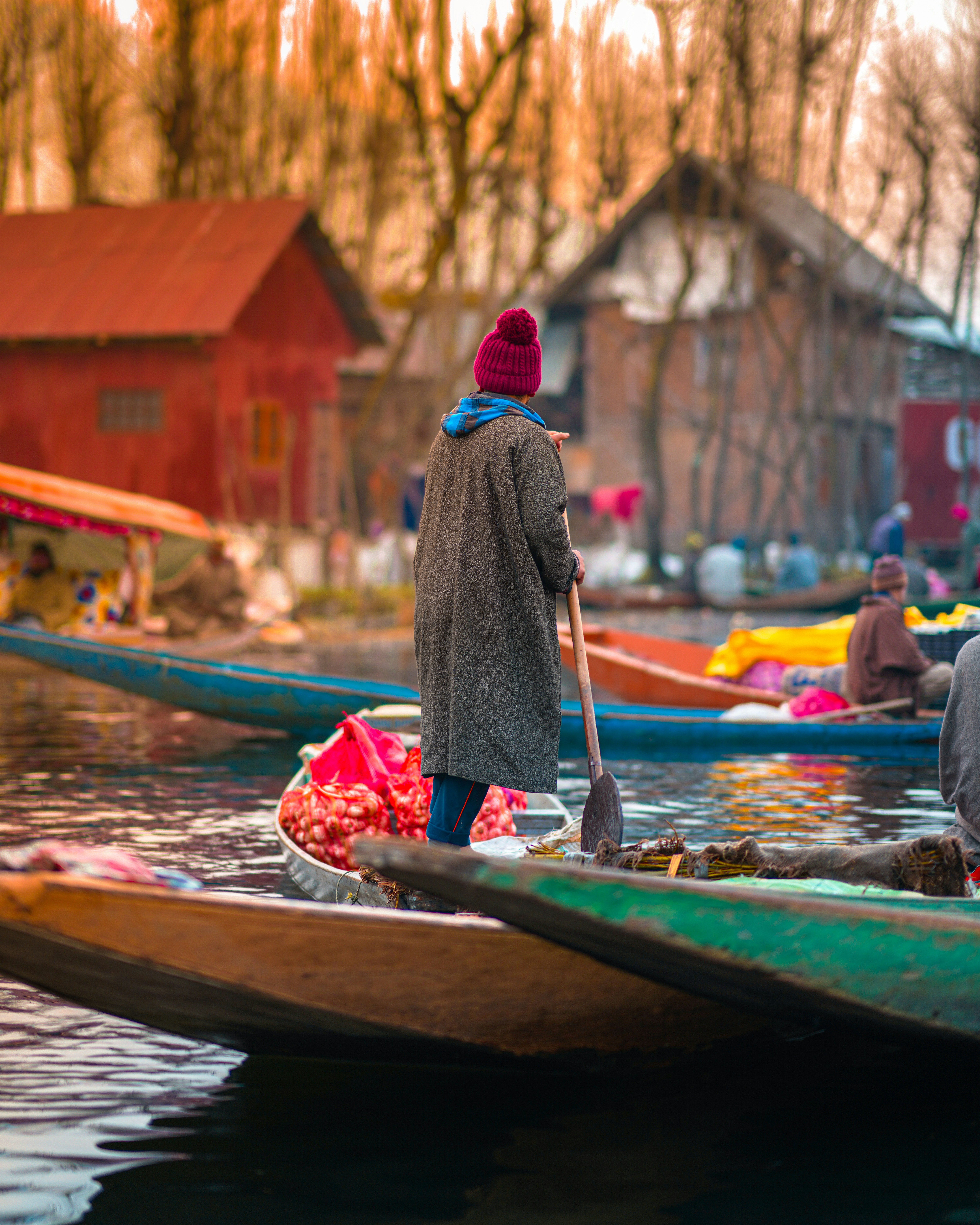 A beautiful traditional Kashmiri boat, known as a Shikara, on Dal Lake.